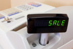 Cash register with sale illuminated